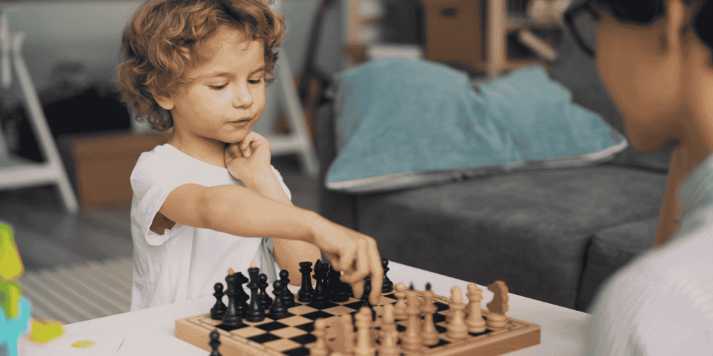 kid playing chess