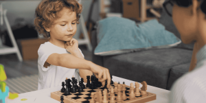 Kid playing chess